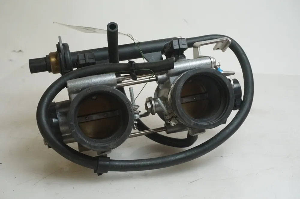 Těleso škrticí klapky BMW