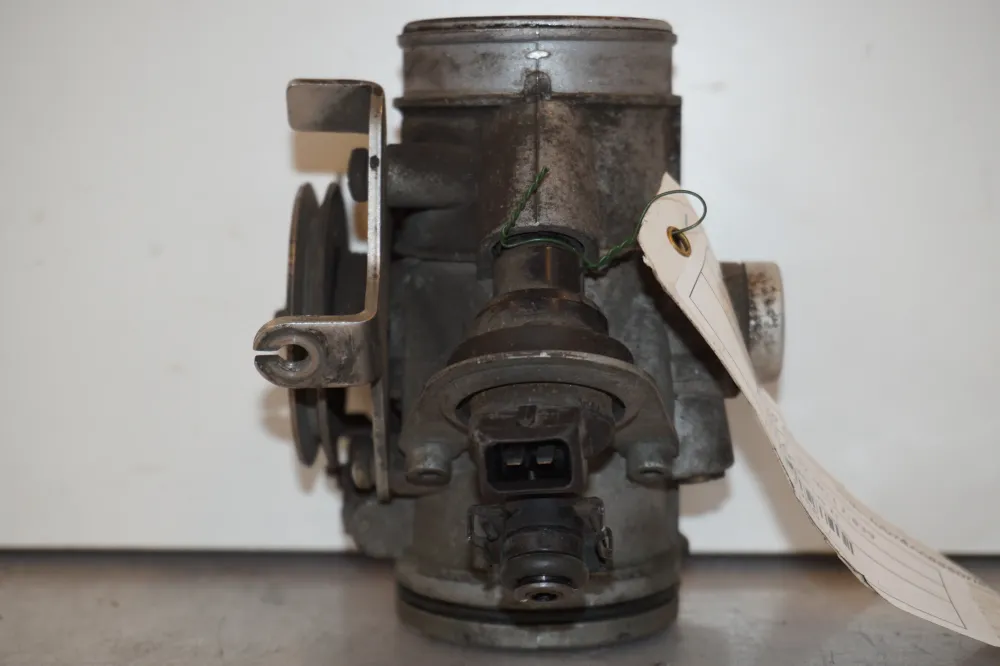 Těleso škrticí klapky BMW