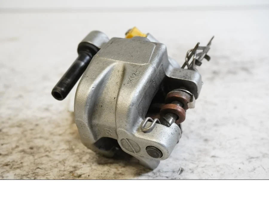 Brzdový třmen Husqvarna