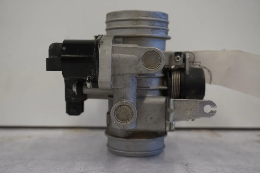 Těleso škrticí klapky Husqvarna