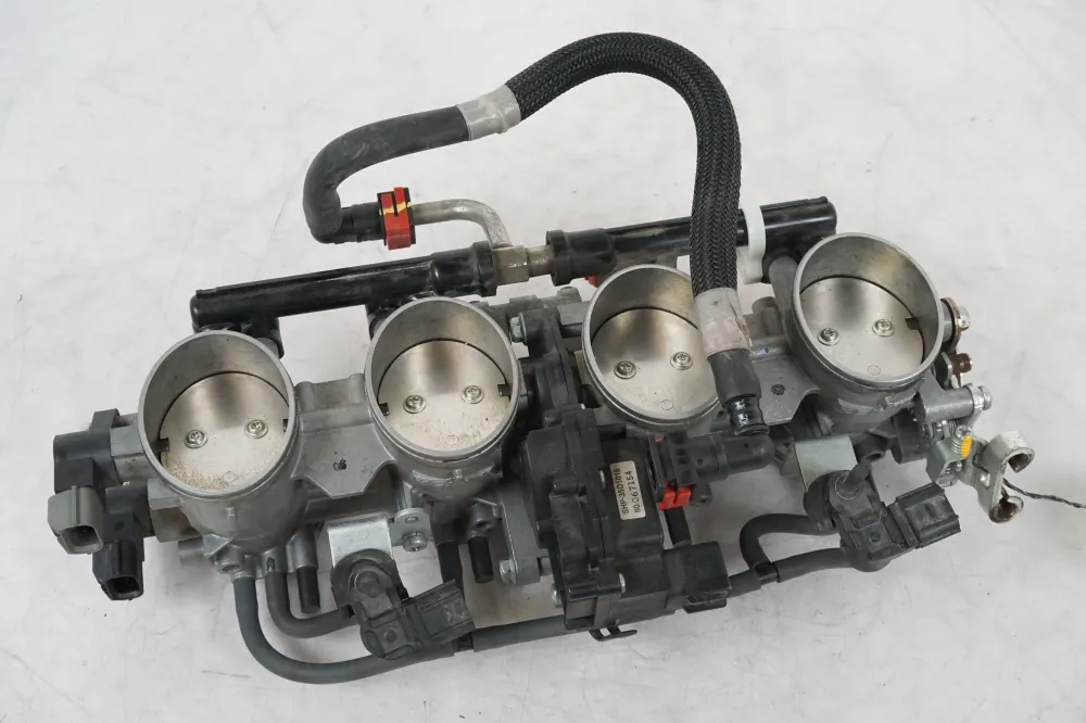 Těleso škrticí klapky Kawasaki