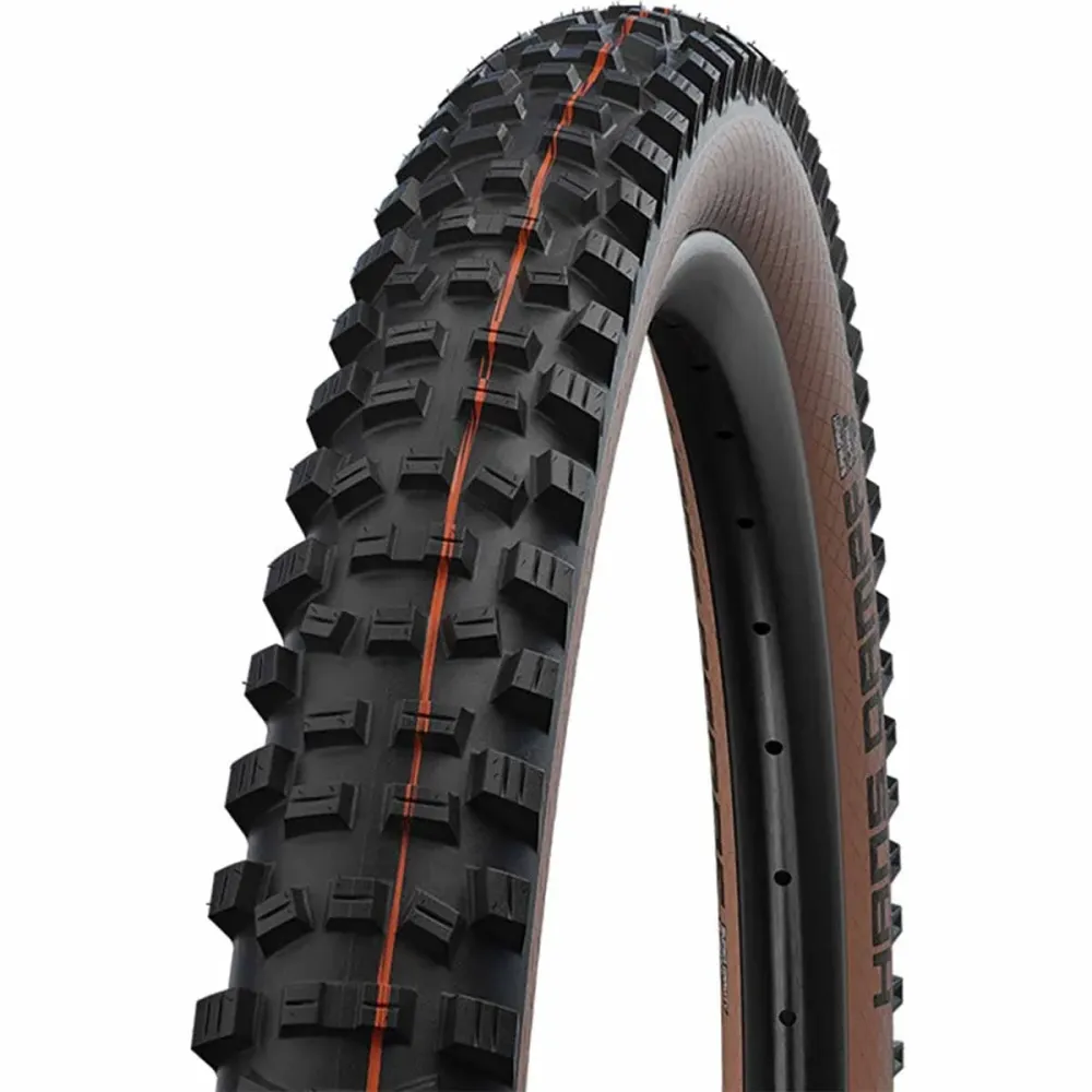 SCHWALBE HANS DAMPF 27.5x2.35 ADDIX SOFT SUPERTRAIL bezdušová pneumatika Soft Black/Brown