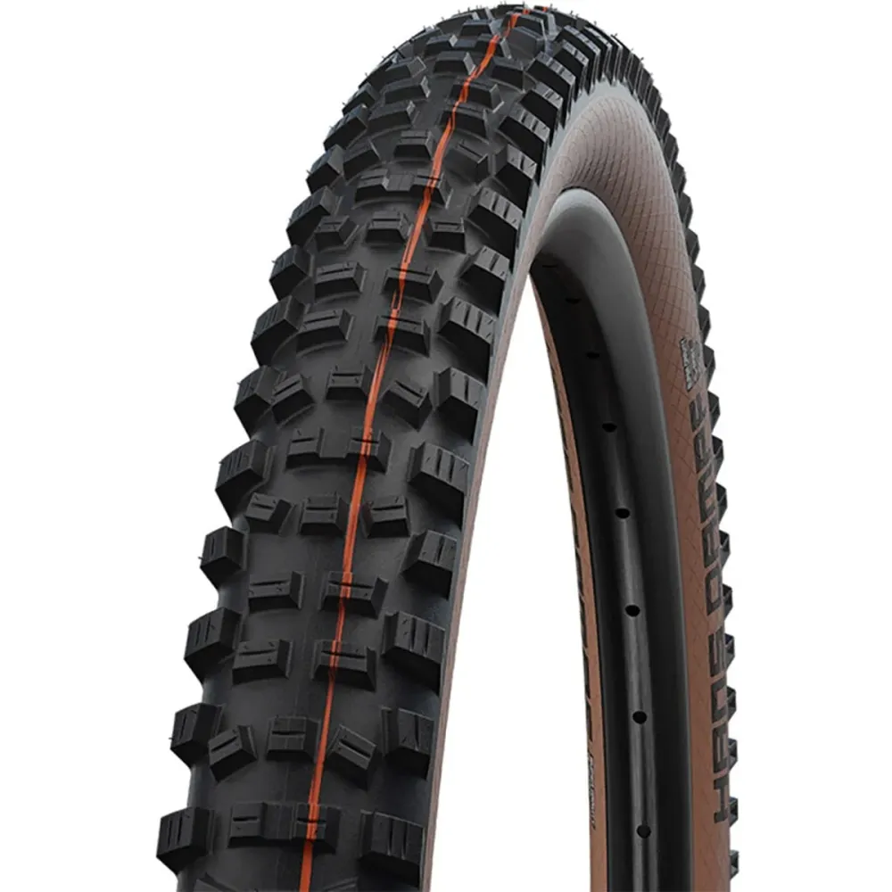 SCHWALBE HANS DAMPF 27.5x2.60 ADDIX SOFT SUPERTRAIL bezdušová pneumatika Soft Black/Brown