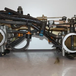 těleso škrticí klapky Suzuki