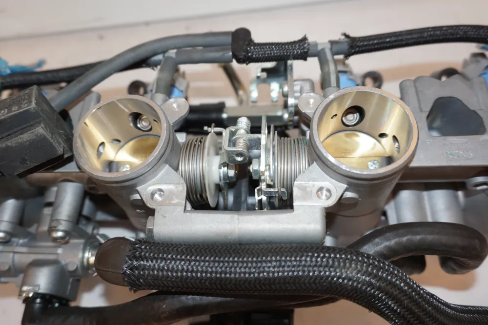 Těleso škrticí klapky Suzuki