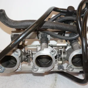 Těleso škrticí klapky Triumph