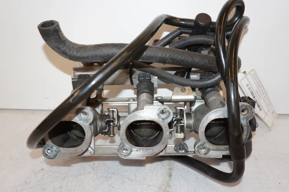 Těleso škrticí klapky Triumph
