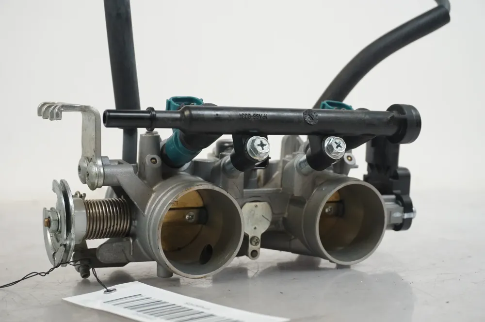 Škrticí těleso Yamaha