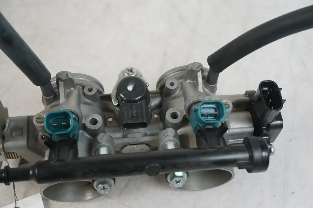 Škrticí těleso Yamaha